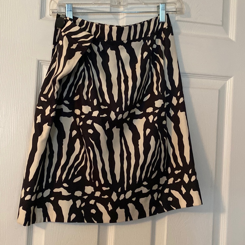 Woman’s cute wrap around zebra print skirt with zipper and side button skirt